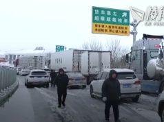 湖北雨雪天氣癱瘓春運 當局動員萬人鏟雪清路